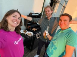 Team grilling on the rooftop